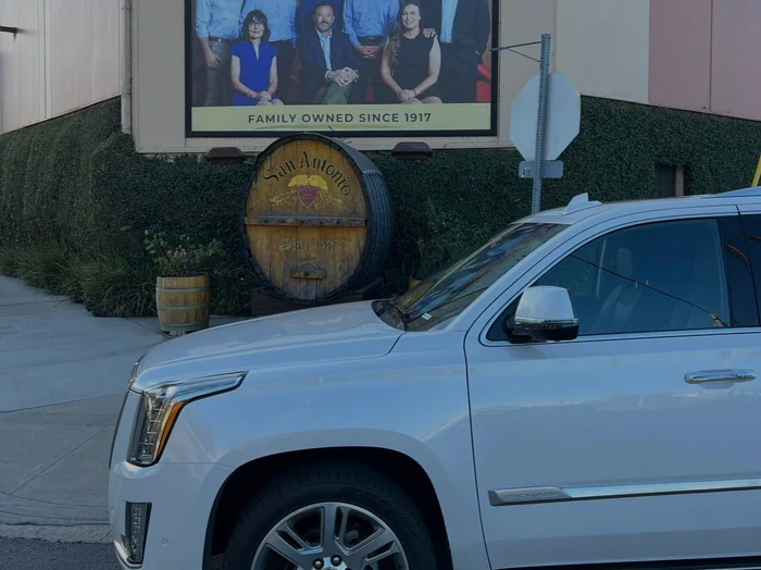 White luxury SUV parked at San Antonio Winery in Los Angeles